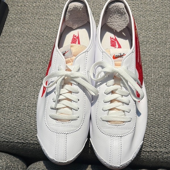 Nike Other - Nike White and Red Sneakers with Bold Swoosh and Classic Design